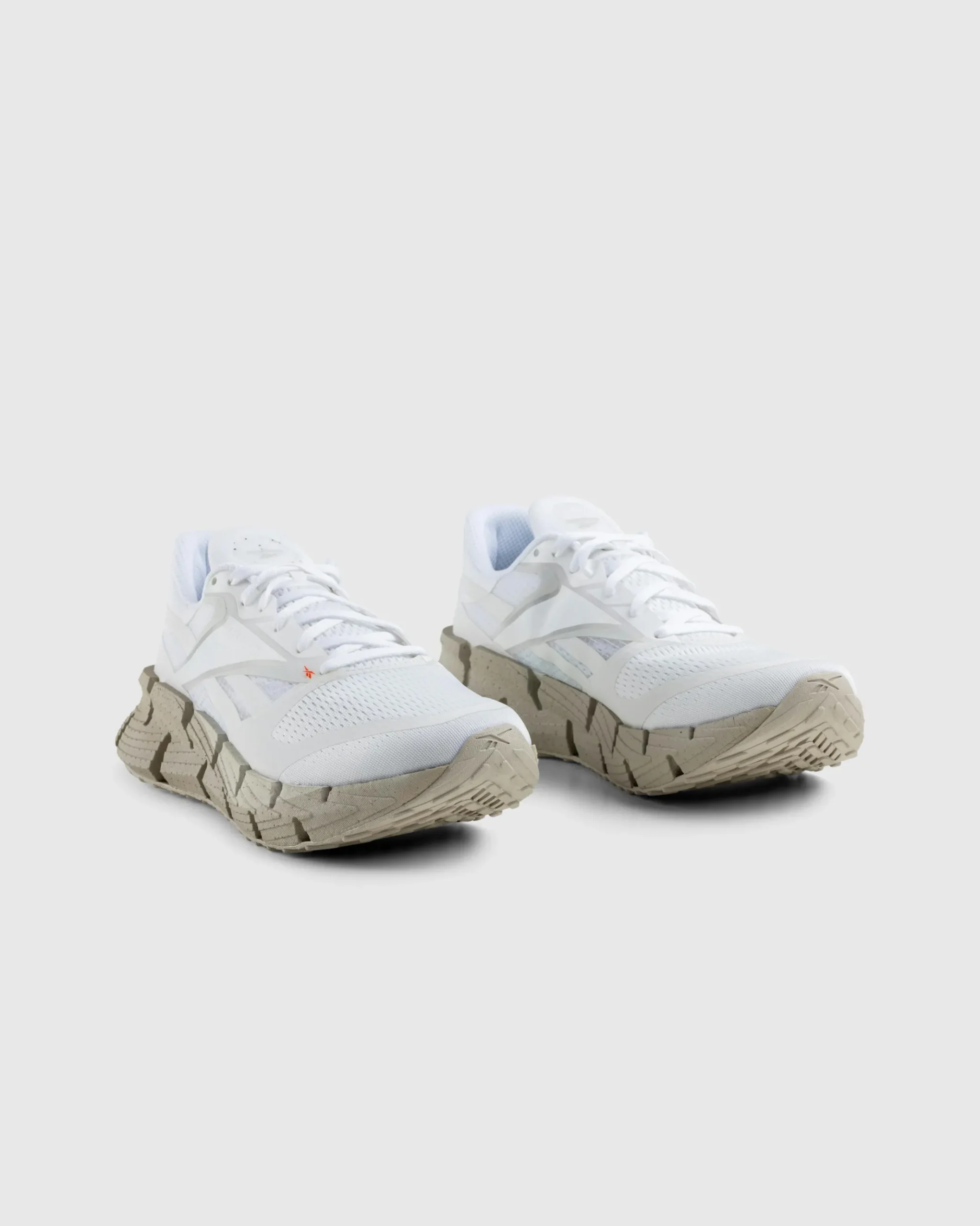 Discount Reebok LTD FloatZig White ftwwhite/pugry1/moonstone