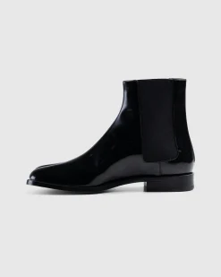 Shop Maison Margiela Leather Tabi Ankle Boot black/washed