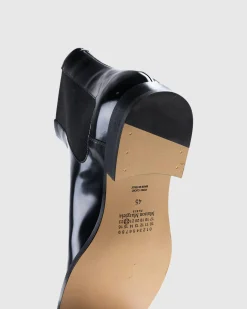 Shop Maison Margiela Leather Tabi Ankle Boot black/washed