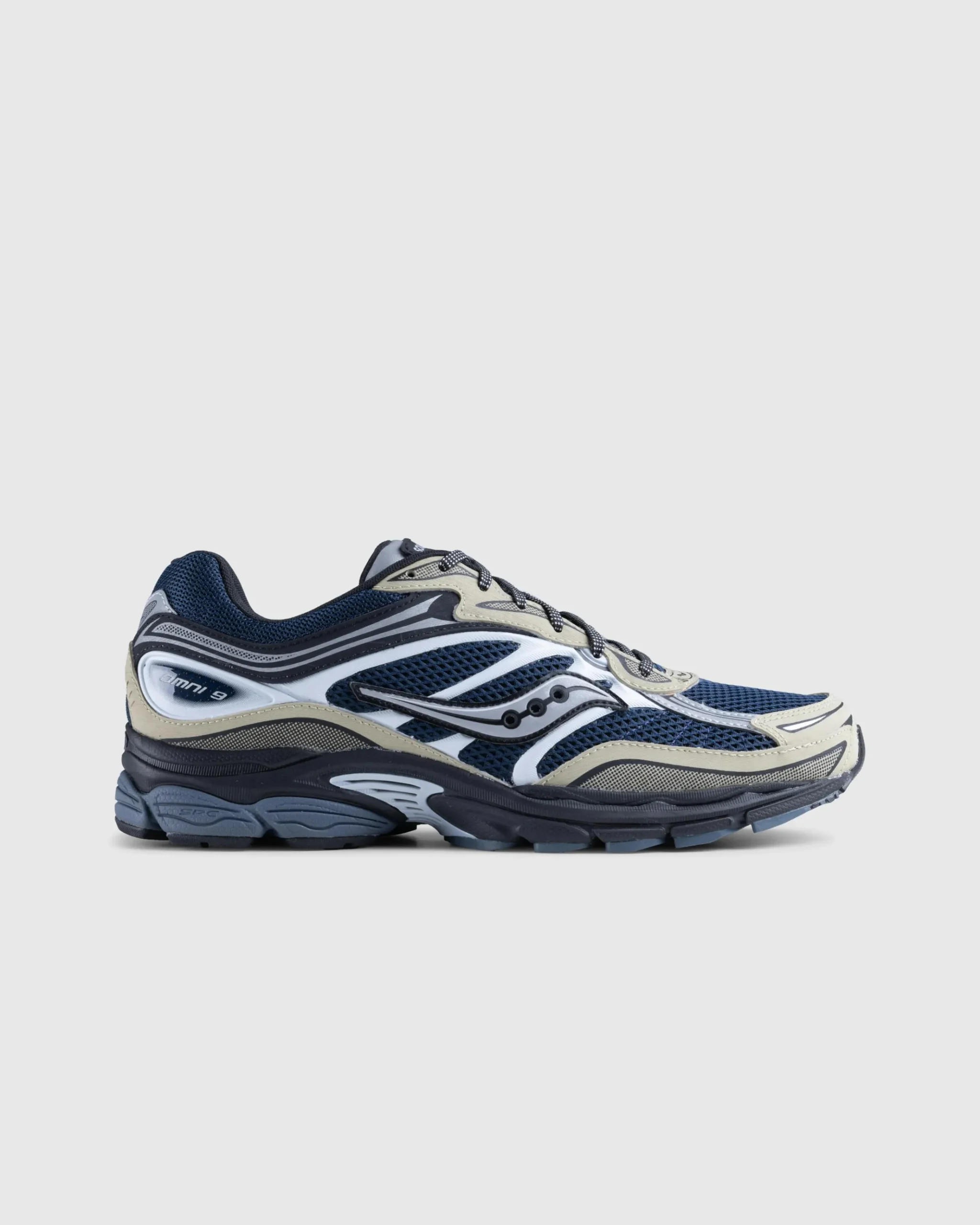 Shop Saucony ProGrid Omni 9 blue/brass